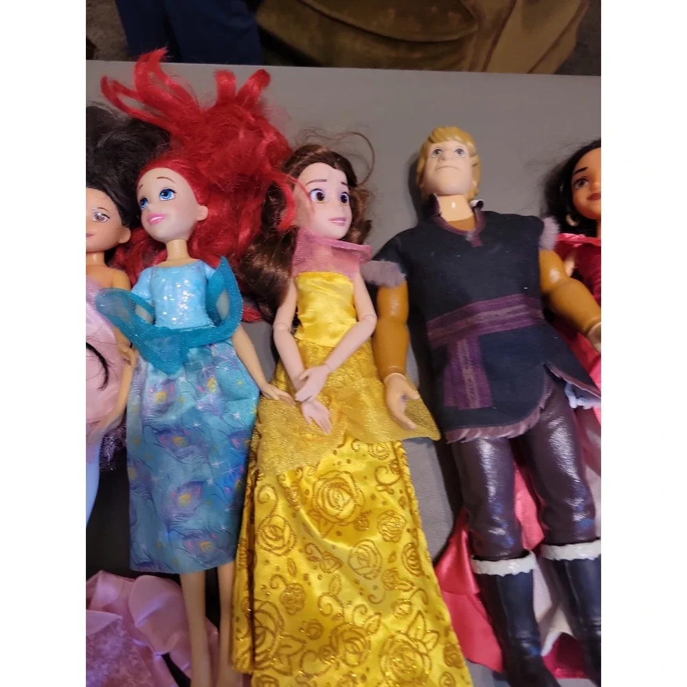 Disney Barbie dolls with extra dresses shoes etc... Mixed lot